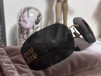 MiuMiu Women’s Sunglasses 
