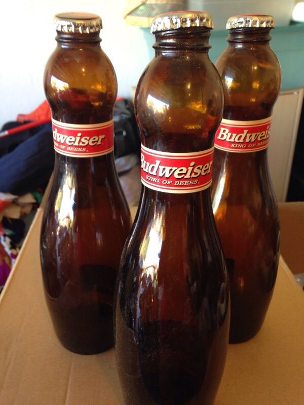1997 Budweiser 1 pint Bowling Pin Shaped beer bottle with kids