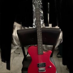 First Act red electric guitar 