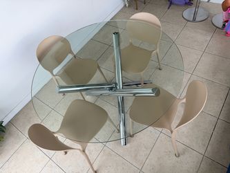 Round glass dinning table with chrome base