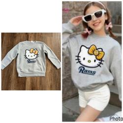 Size 7/8, rams hello kitty crew neck