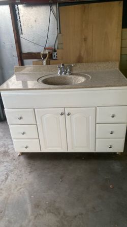 Bathroom sink, cabinet and faucet