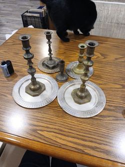 Antique candlesticks and plates