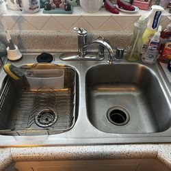 33” 22” Stainless Steel Sin With Attached Garbage Disposal And Dishwasher Attachment And Faucet. 