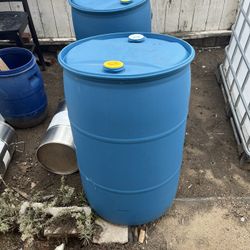 55 gallon Plastic Drums clothes top $20 each
