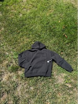 black fear of god essentials hoodie