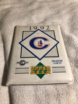 32 Reds cards, in book with a few stars