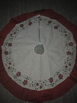 Christmas tree skirt with poinsettia embroidery