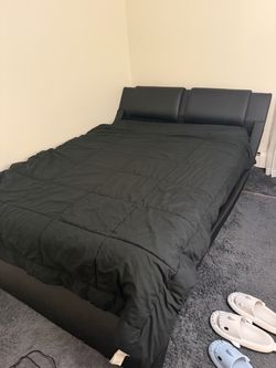 Queen sized bed with frame