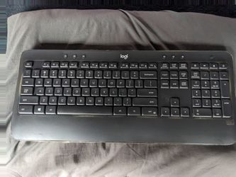 Logitech K540 wireless keyboard with dongle and speaker bar