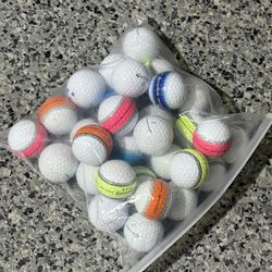 30 TAYLORMADE TOUR RESPONSE & STRIPE GOLF BALLS used but good