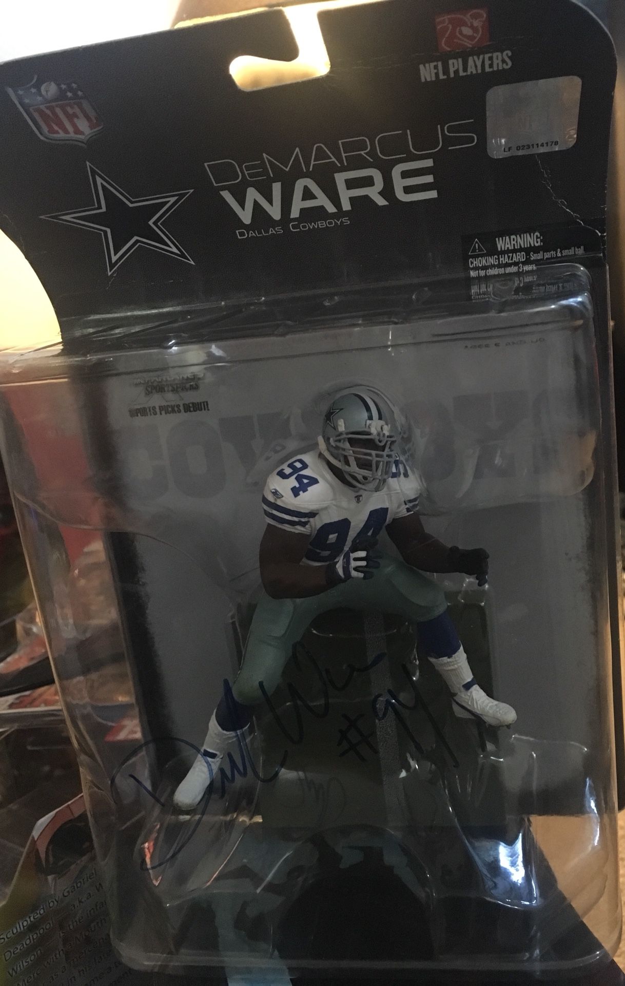 Autographed Demarcus Ware figure by Mcfarlane Toys