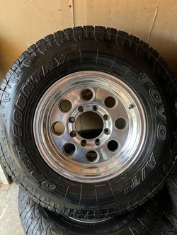 Set of 4 Ford E-250 Wheels & Corsa Highway Terrain Tires - 8 Lug