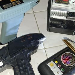 Collection of Star Trek Toy Communicator, Tricorder and Phasers
