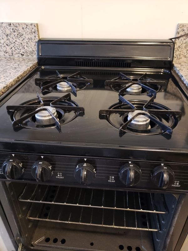 24 inch black stove working.Needs gas leak repair.Low price because