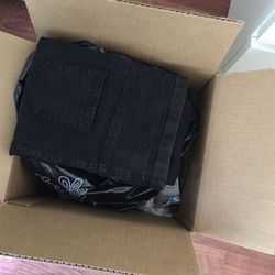 Box of Maternity Clothes and Supplies