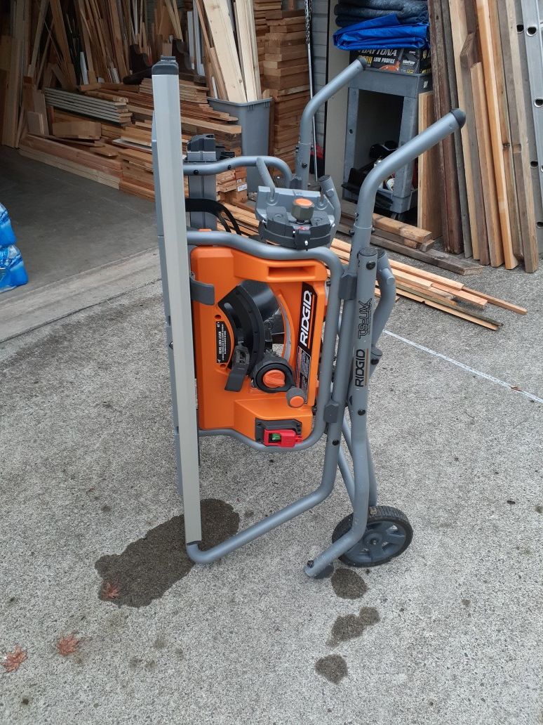 10 " RIDGID TABLE SAW 5 MOUTH'S OLD