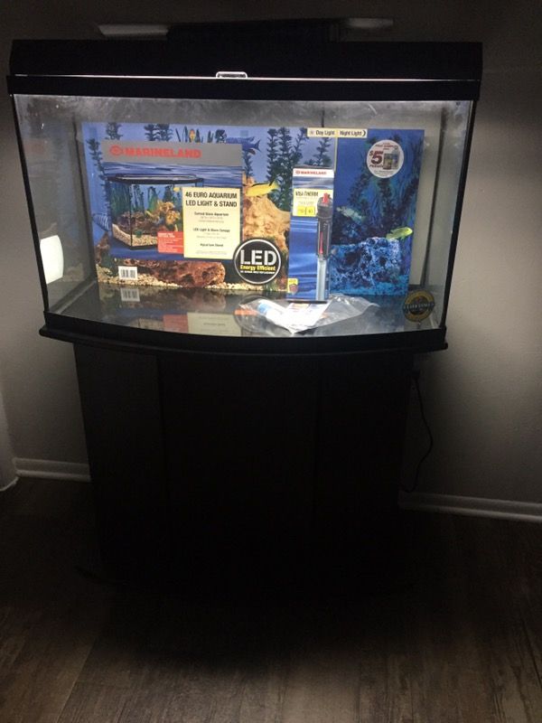 Used for one month only marineland 46 Gallon bow front aquarium(please no window shoppers ) message if your serious !