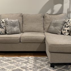 Gray Couch With 4 Pillows