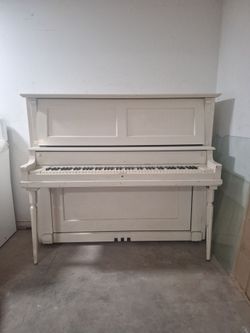 White Upright Piano with Turned Legs