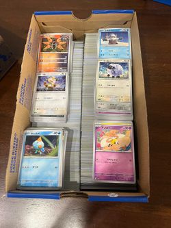 Pokemon lot of foreign language cards & energy card lot