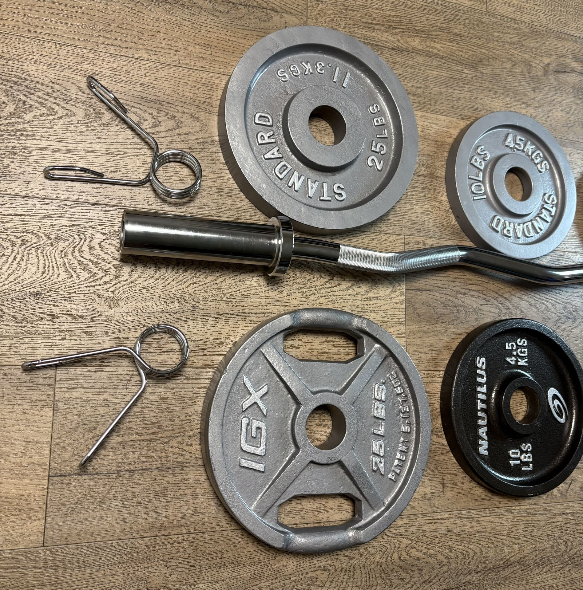 NEW Olympic Curl Bar With Pairs From 5s To 25s [total: 105 lbs)