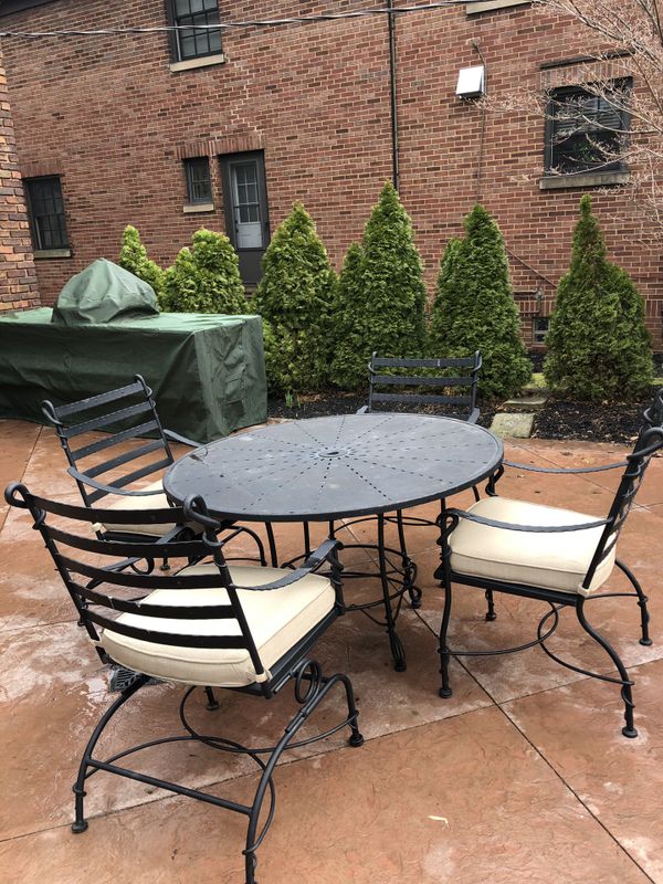 Arhaus Black Wrought Iron Patio Table With Four Chairs And Cushions Arhaus Black Wrought Iron Patio Table With Four Chairs And Cushions