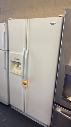 Nice Whirlpool side by side refrigerator