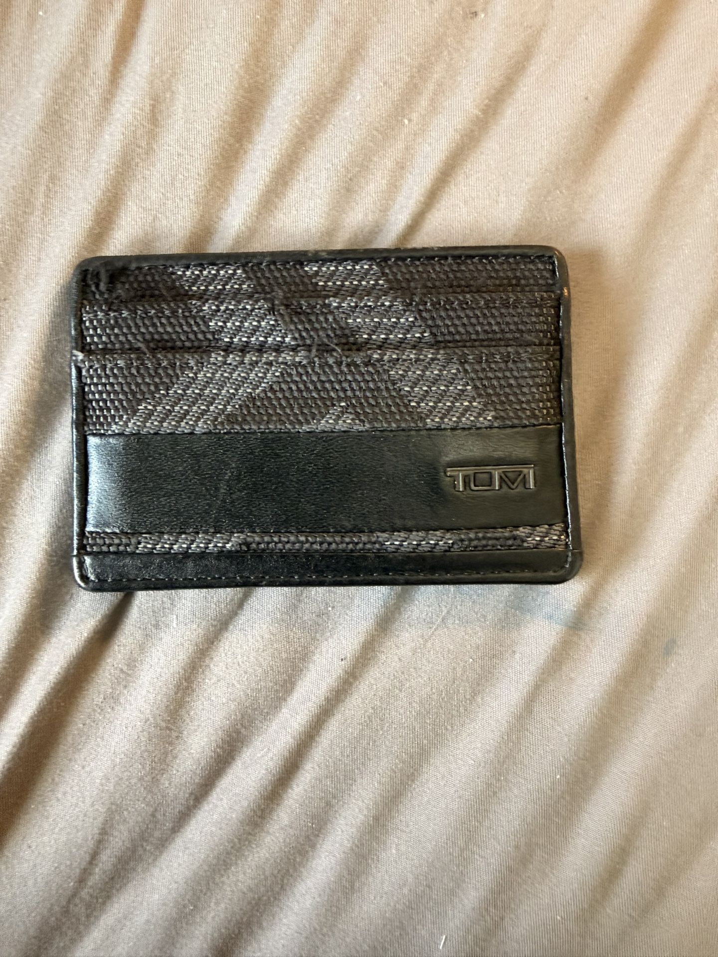 Tumi Slim Wallet.