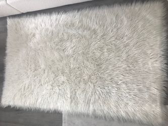 Faux fur area rug
