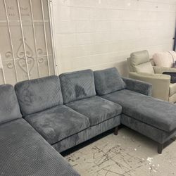 New Duo Chaise Sectional.  Grey Corduroy Fabric.  85 X 100 X 85.  Free Delivery!