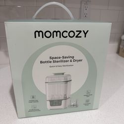 New/unopened Momcozy bottle sterilizer and dryer
