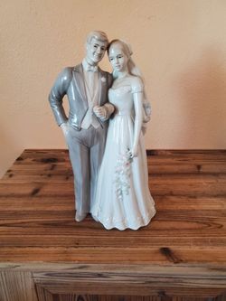 1986 Porcelain Figurines $25