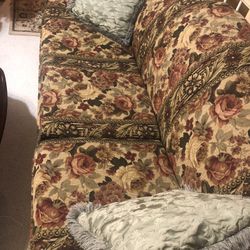 A Beautiful Sofa ,Loveseat With a Front table And two End Tables 