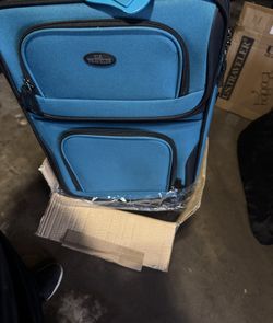 2 Luggage Bags.   60$ For Both 