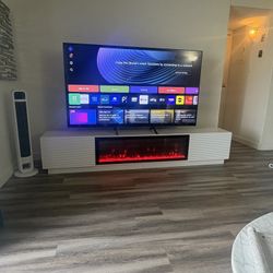 75” LG 4k Tv And Fireplace Stand Like New 