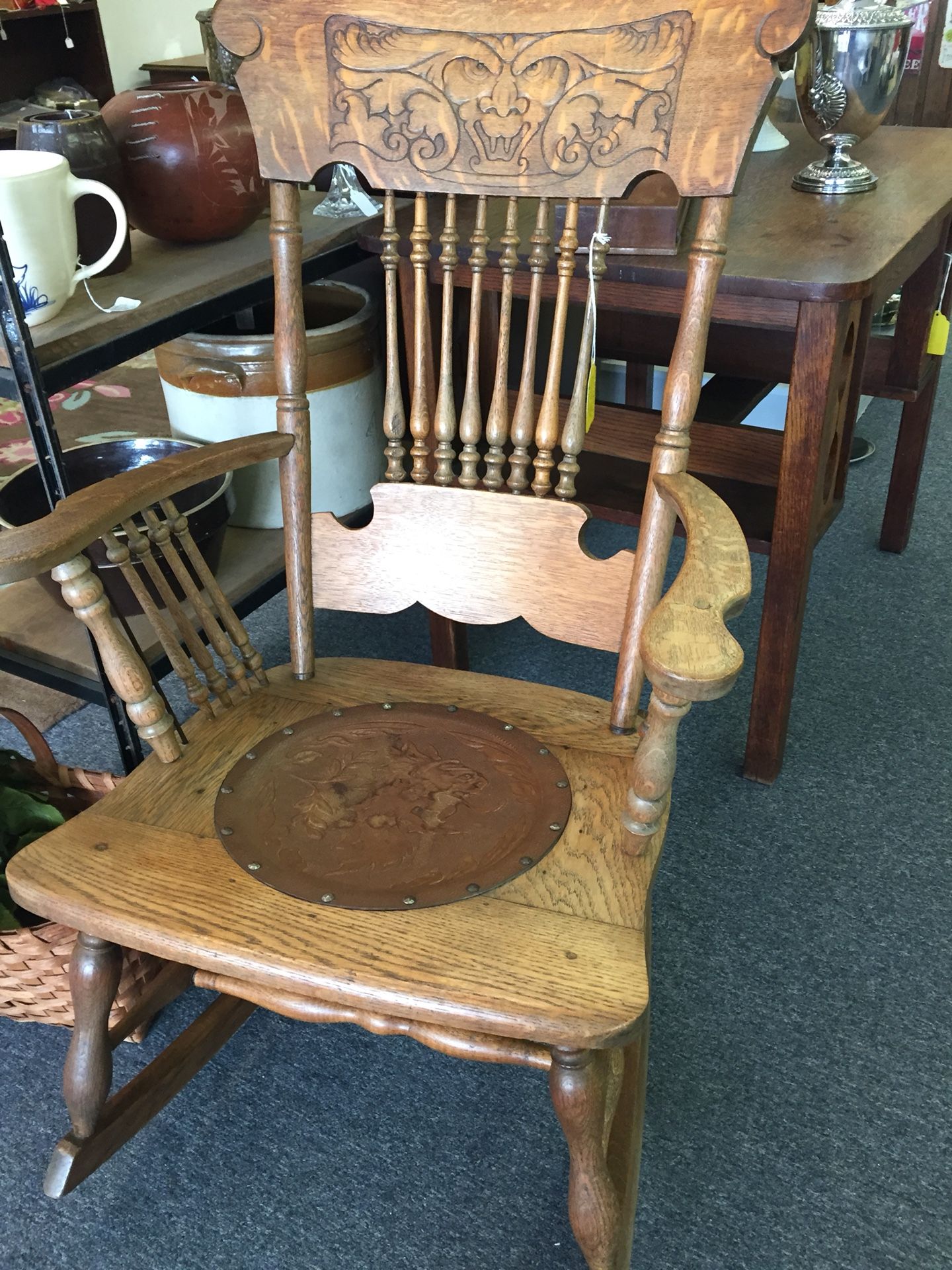 Antique Oak Rocking Chair w/ carved face leather seat