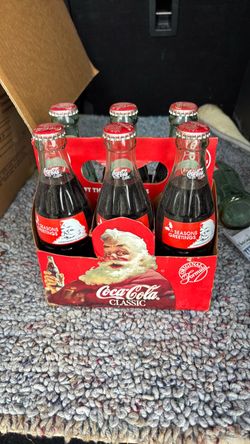 Coca-Cola seasons greetings six pack 8 ounce bottles Coca-Cola seasons greetings six pack 8 ounce bottles