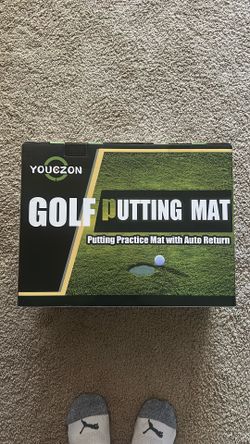 Golf putting mat