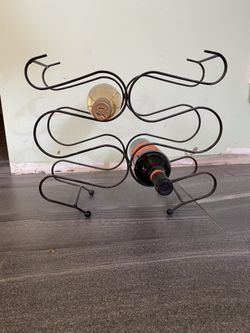 Black metal wine rack