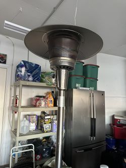 Out Door Heater Like New, With Cover And Wheels