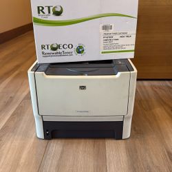 HP Laser Printer And New Cartridge 