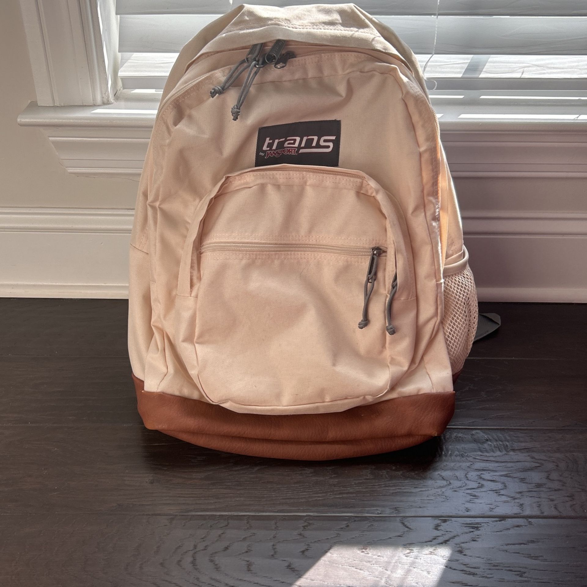 beige trans by jansport backpack
