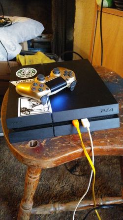 PlayStation 4 with games and control