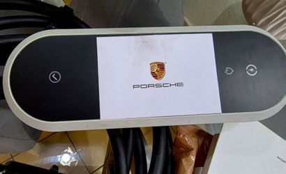 Charger for electric Porsche. All accessories included.