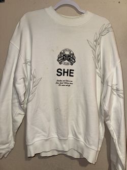 White “SHE / Wolves Club” sweatshirt — visible staining