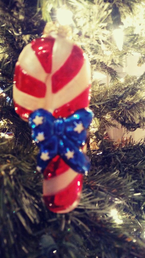 Red white and blue candy cane christmas ornament