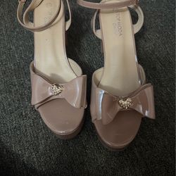 Nude platform heels with bow size 11
