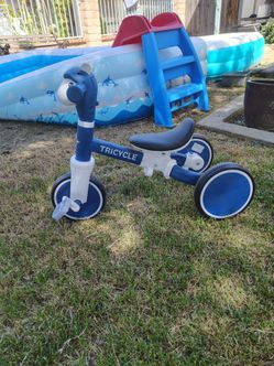 Toddlers tricycle with flashing lights and music