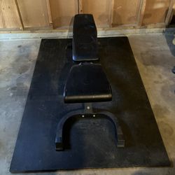 Adjustable Weight Bench &Rubber Mat. No weights included, $60.